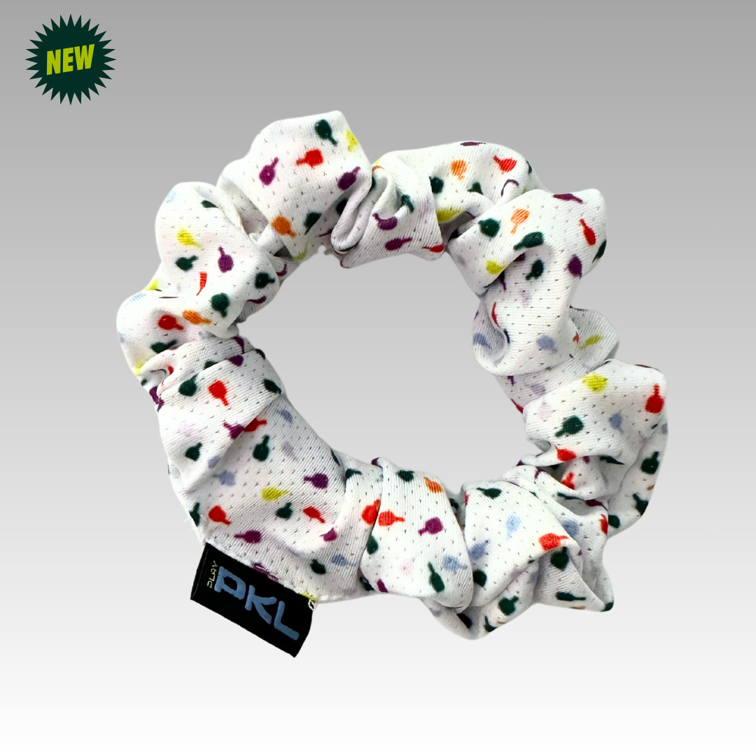 White scrunchie with colorful polka dots