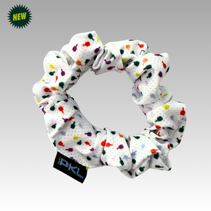 White scrunchie with colorful polka dots