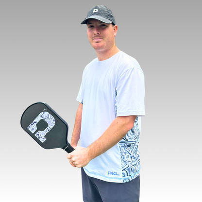 Man holding a pickleball paddle