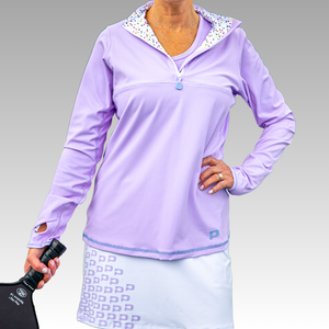 light purple long-sleeve top with a white skirt