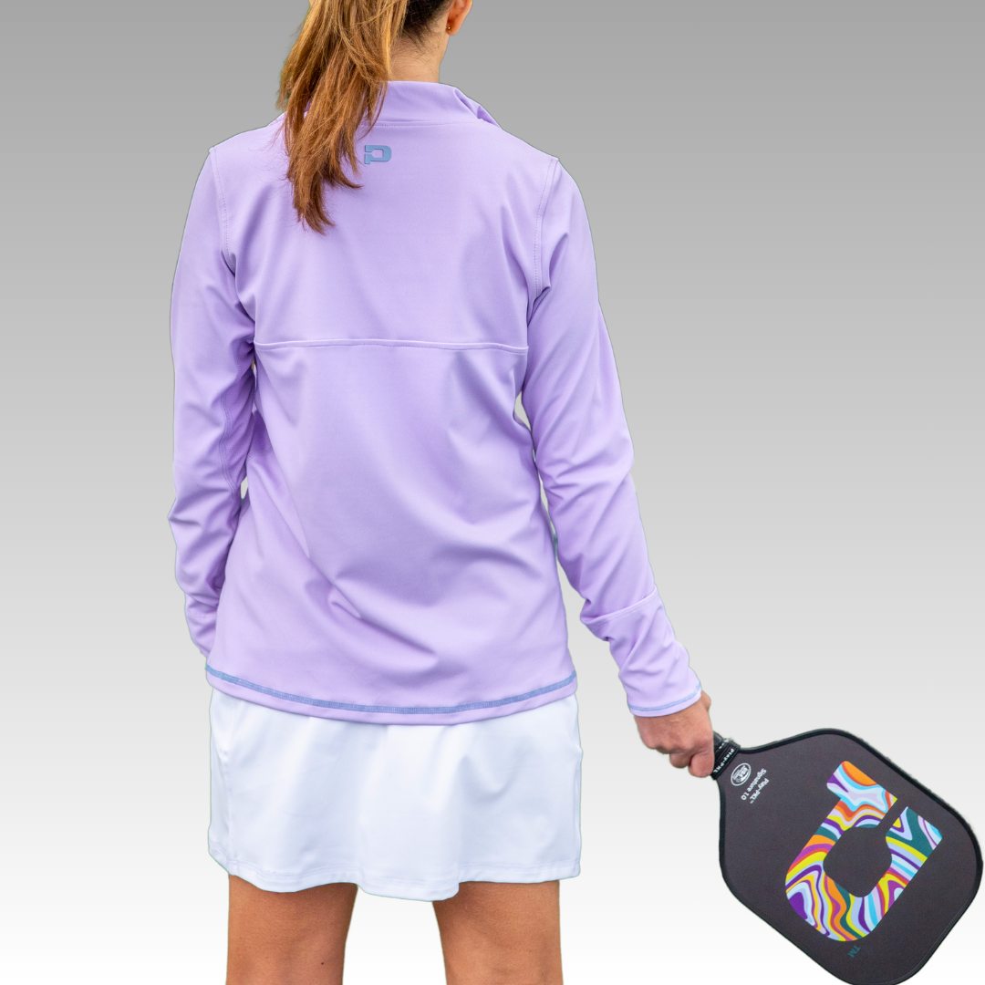light purple long-sleeve top and white skirt