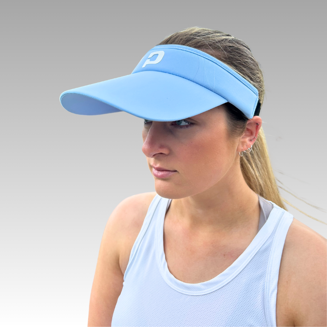 light blue visor and blue tank top