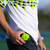 Man in pickleball gear with a pickleball ball in his pocket