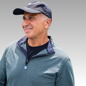 gray cap and Quarter Zip