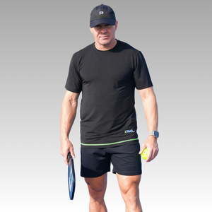 Man in black Warrior Tee and holding a paddle